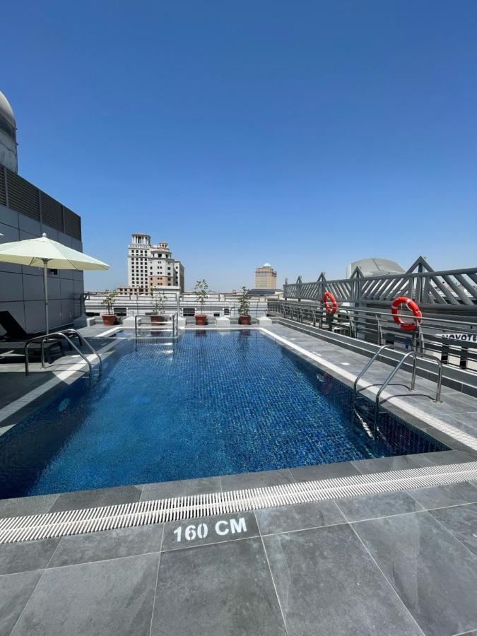 Mena Aparthotel Albarsha At The Mall Dubaï Extérieur photo